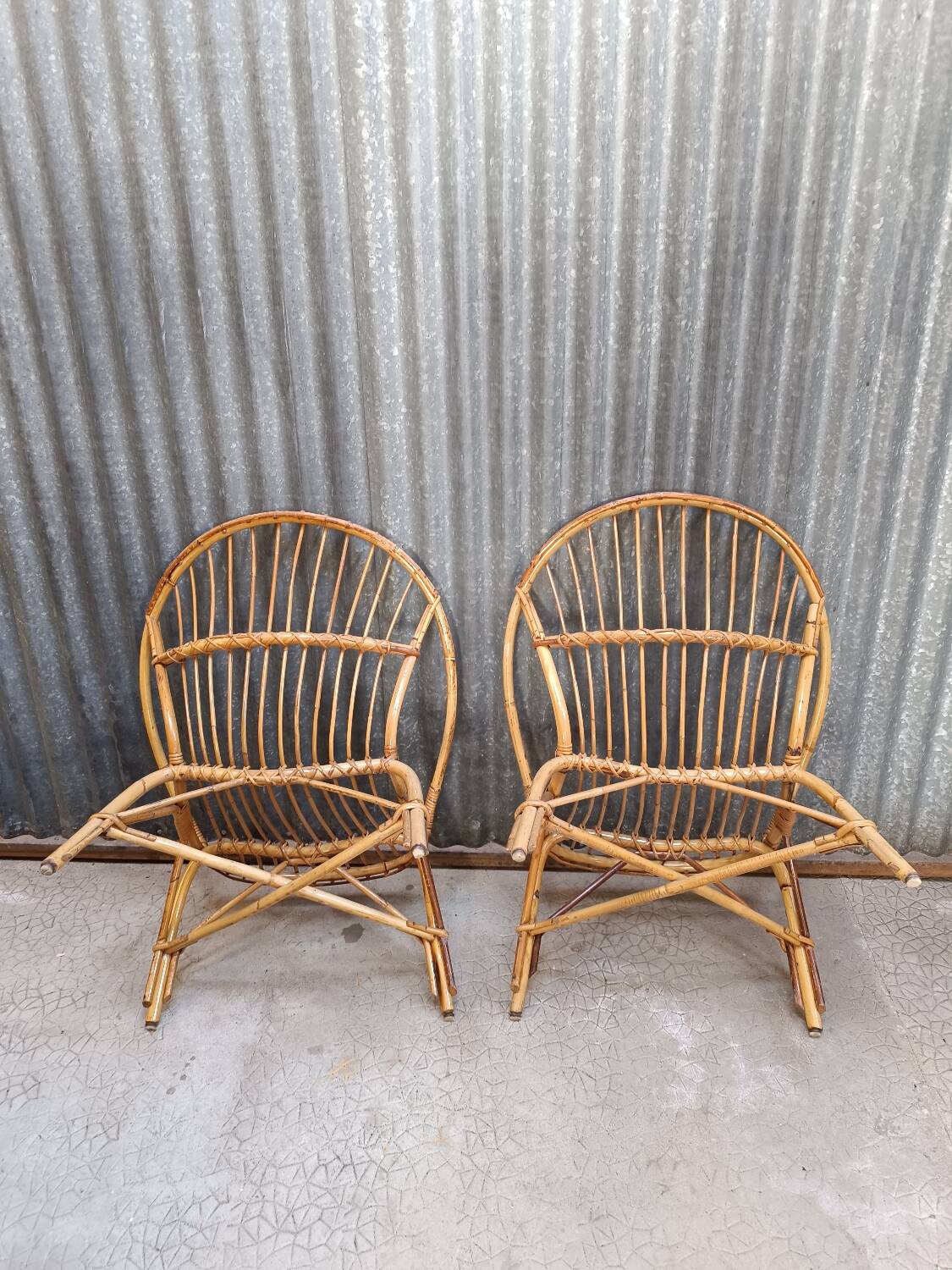 Paire de fauteuils coquille en osier rotin vintage