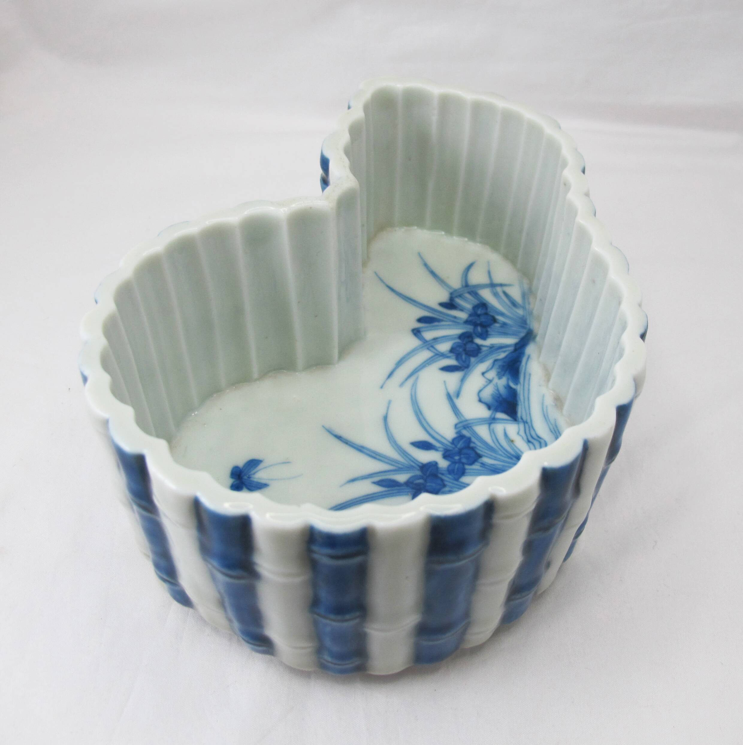 Old Chinese or Japanese blue and white porcelain planter from the late 19th or early 20th century