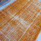 Tapis vintage orange surteint