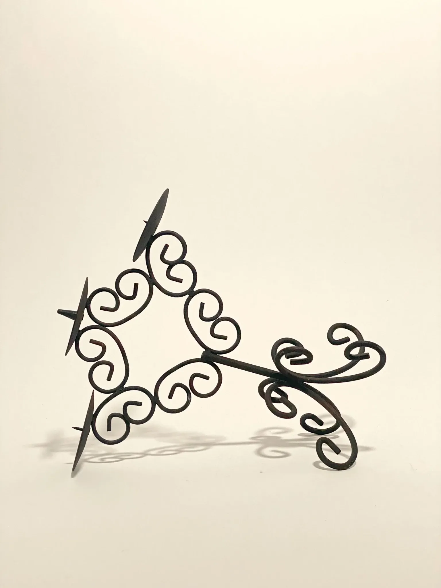 Four-legged candelabrum