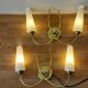 Pair of 1960 wall lamps in gilded brass and glass.