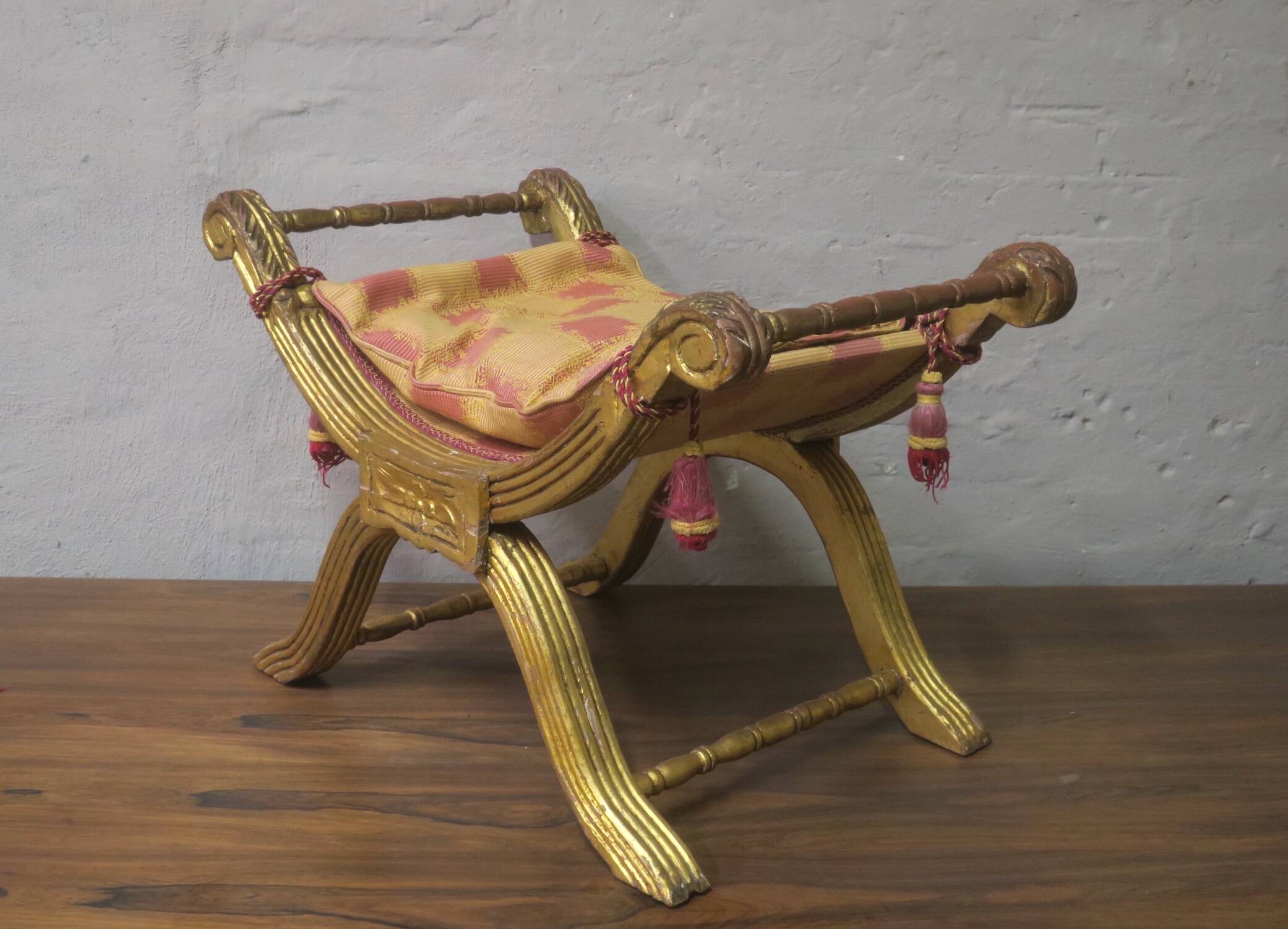 Antique parcel gilt cruciform stool