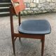 Scandinavian chair sitting in leatherette