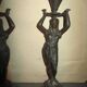Pair of antique Egyptian-style spelter torches.