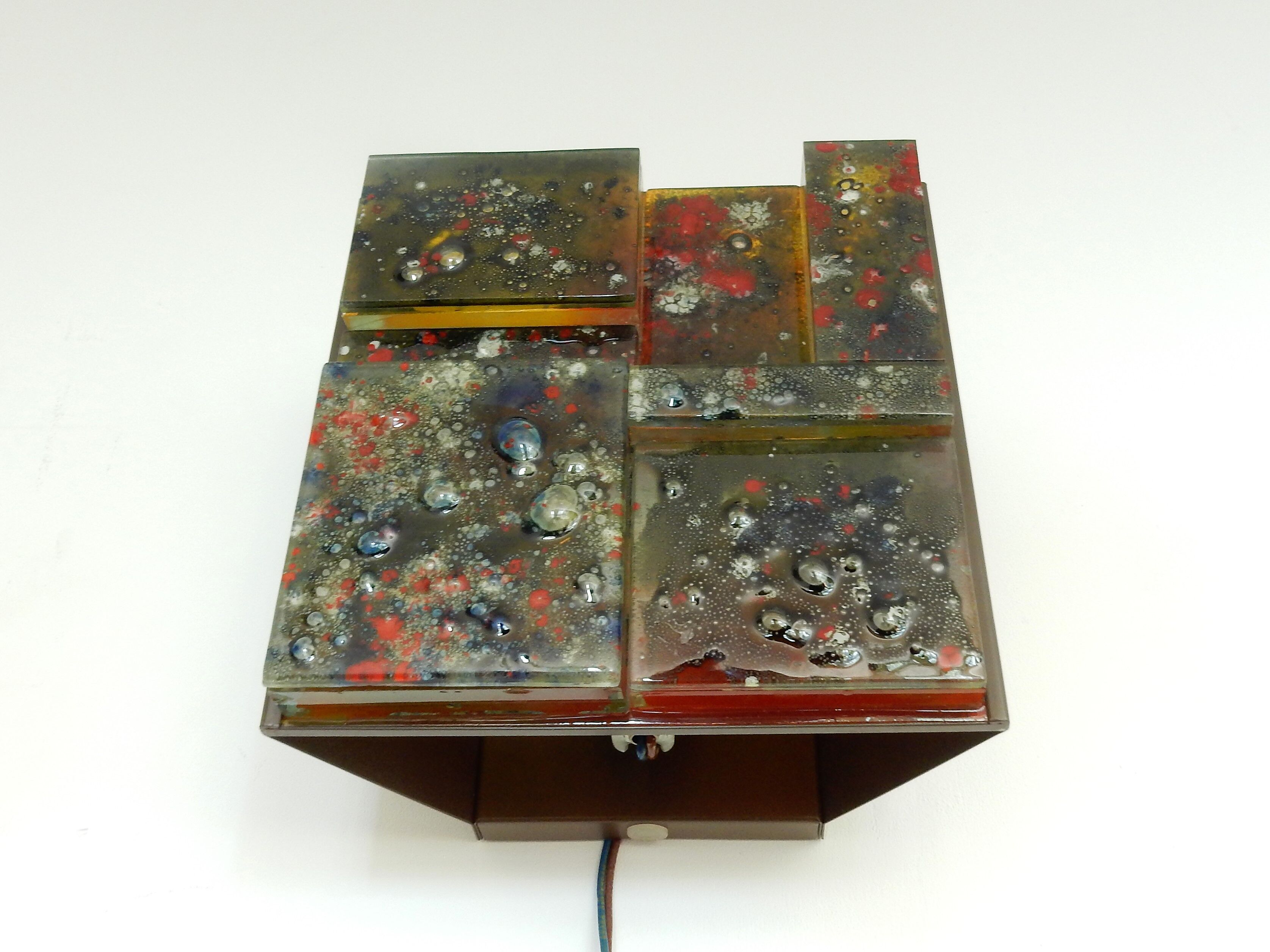 Style-relief wall sconce from Raak, 1960s