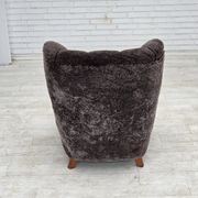 Années 1960, design danois, fauteuil rembourré, véritable peau de mouton.
