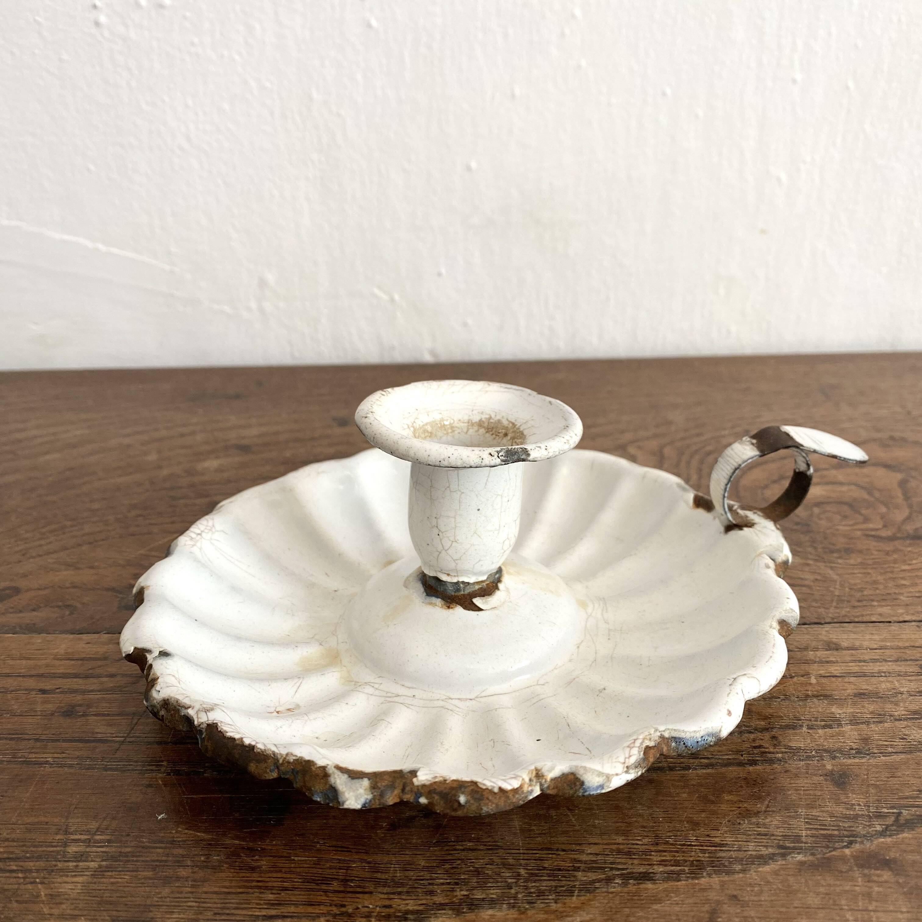 Antique enamelled sheet metal candle holder