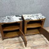 Pair of curved bedside tables with niches, Art Deco period, in mahogany, circa 1920