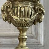 Pair of gilt bronze ram's head candlesticks, Louis XVI style, 19th century.