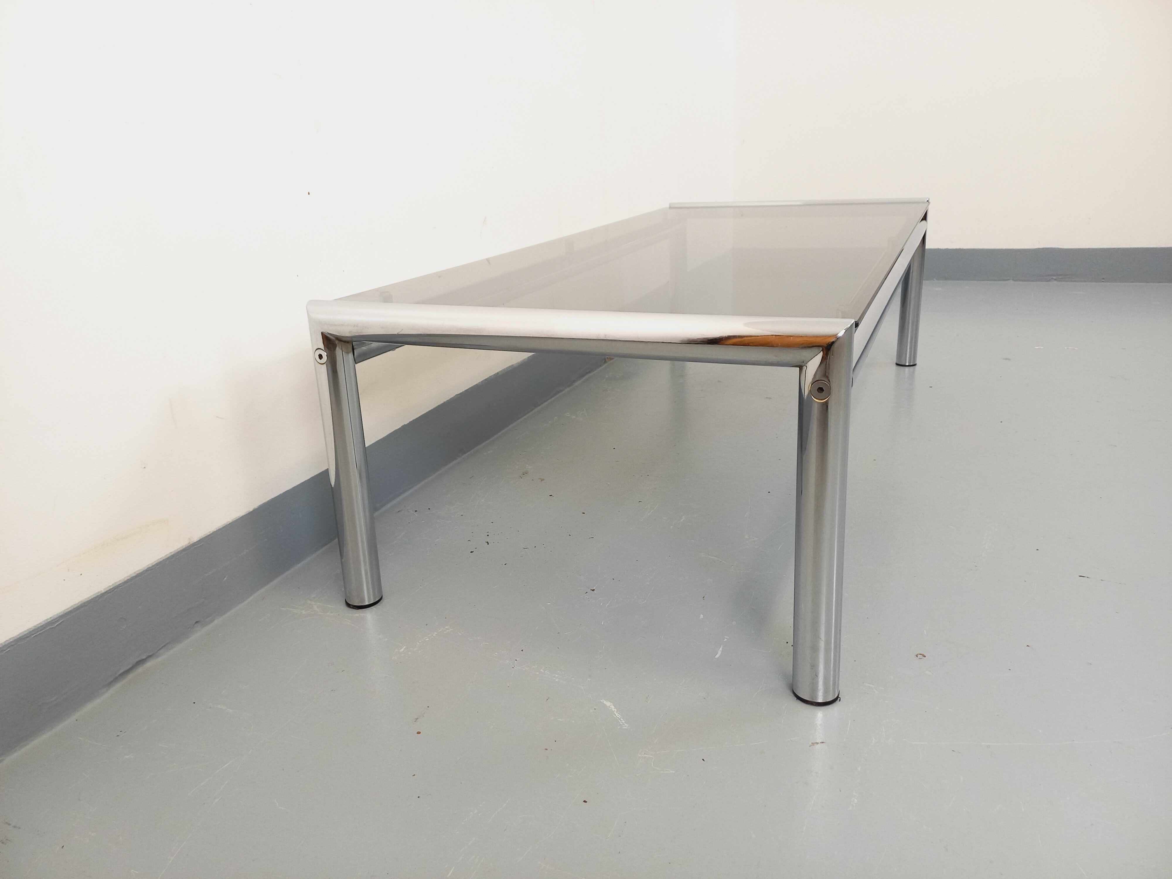 Vintage rectangular coffee table in smoked glass and chrome metal from the 1960s.