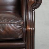 Very beautiful wing chair made of cowhide leather in English style