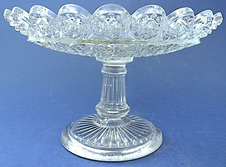 Plate mounted on pressed-molded glass column