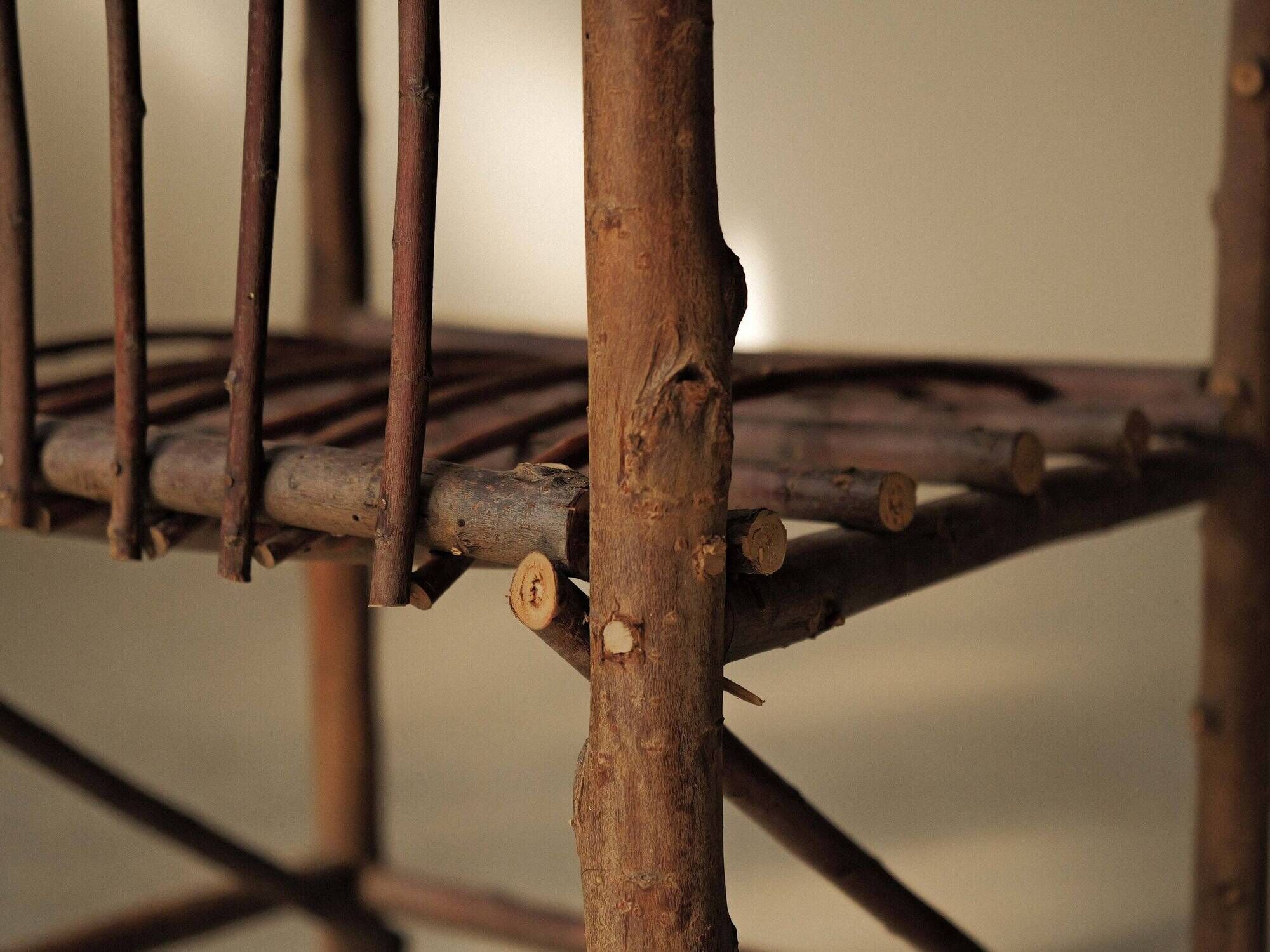 Brutalist armchair made of hazel branches, circa 1970.