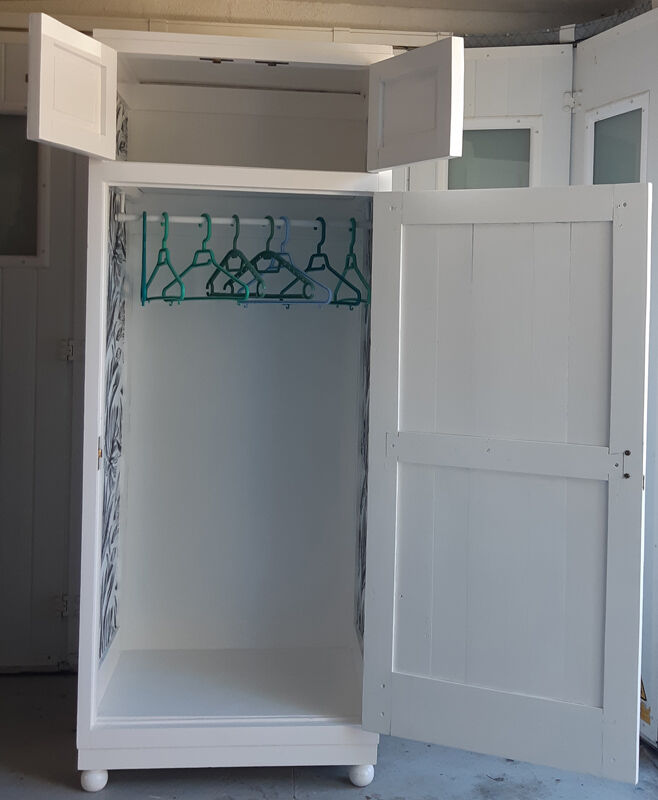 Vintage wardrobe in white wood