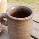 Old condiment pot in glazed pyrity sandstone, with cork lid, mid century