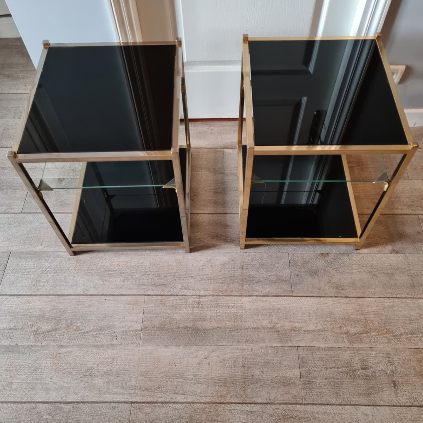 Pair of glass and brass sofa endsl