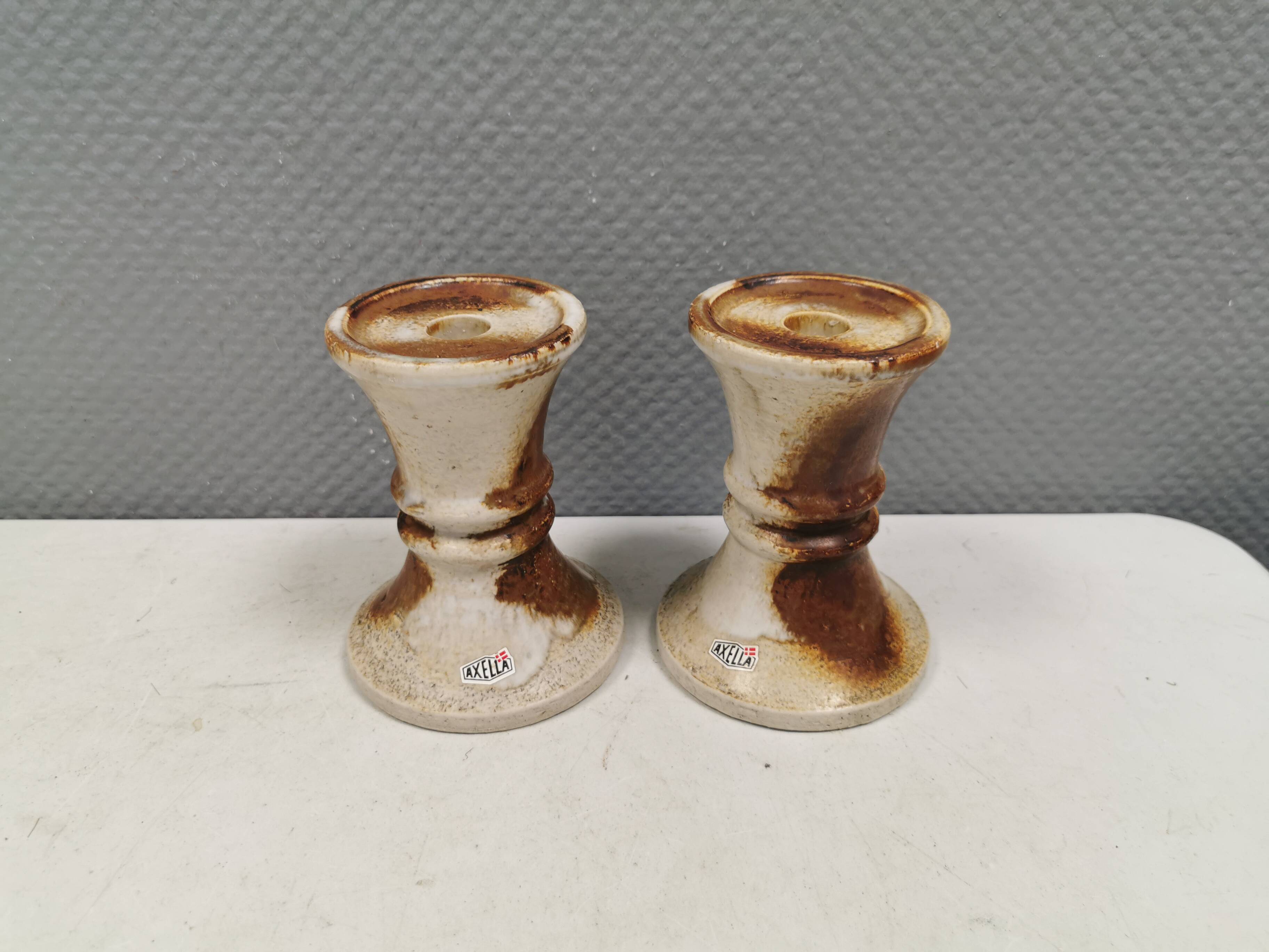 A set of ceramic candleholders by Axel Larsen for his own company, Axella