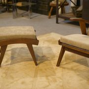 Scandinavian armchair and two 1960s ottomans.