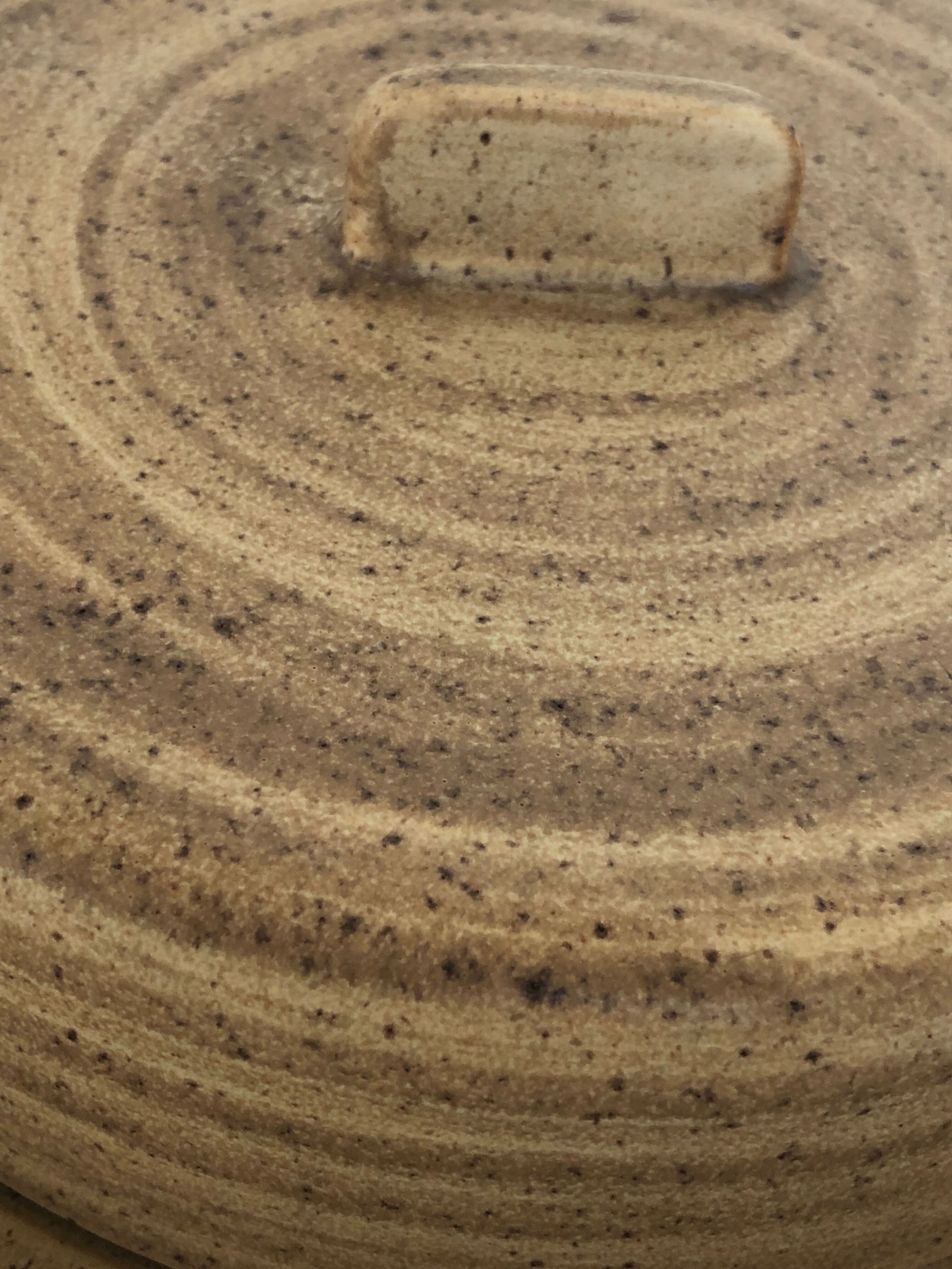 Dish with Bell in speckled sandstone