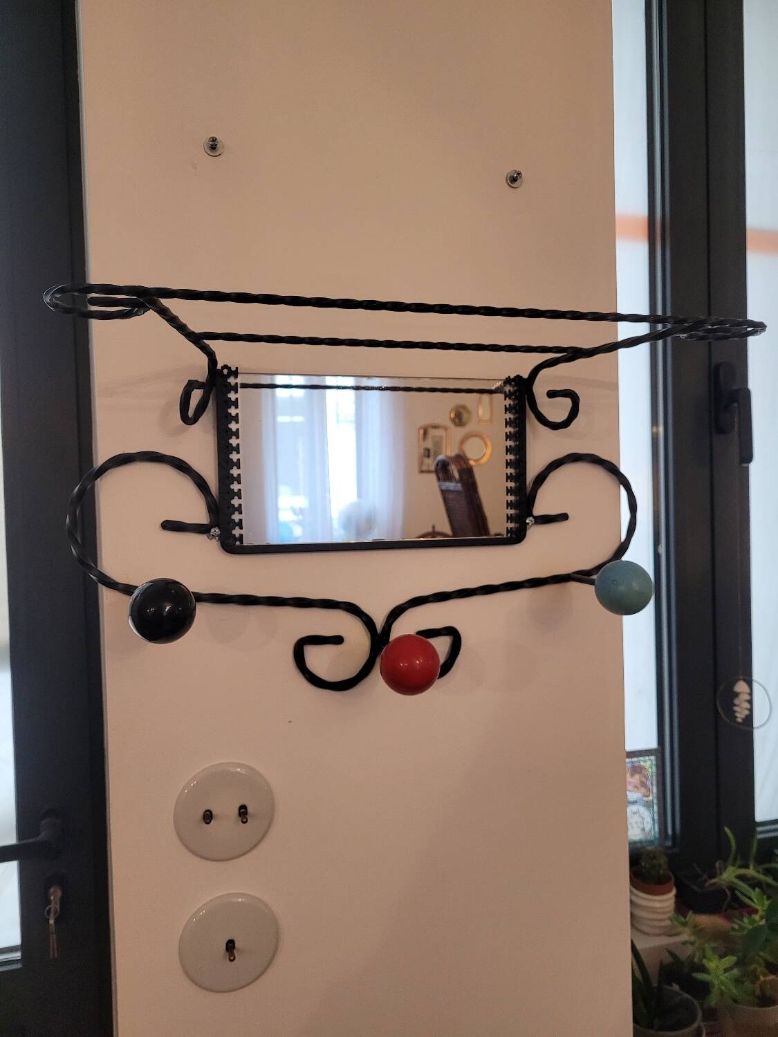 Wrought iron coat rack