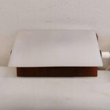 A pair of teak wood wall lamps with plastic shade.
