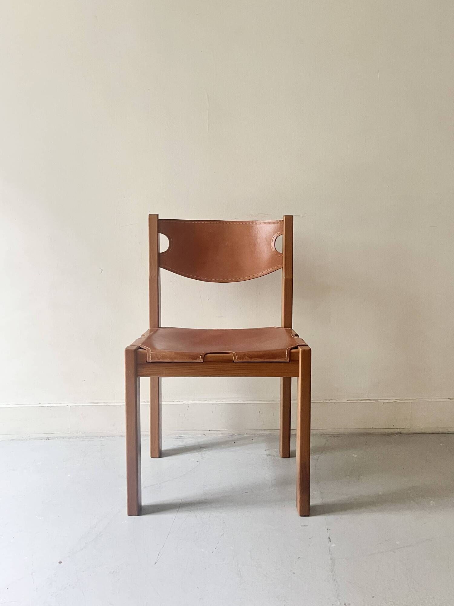 elm wood and camel leather chair Maison Regain, French design 1960