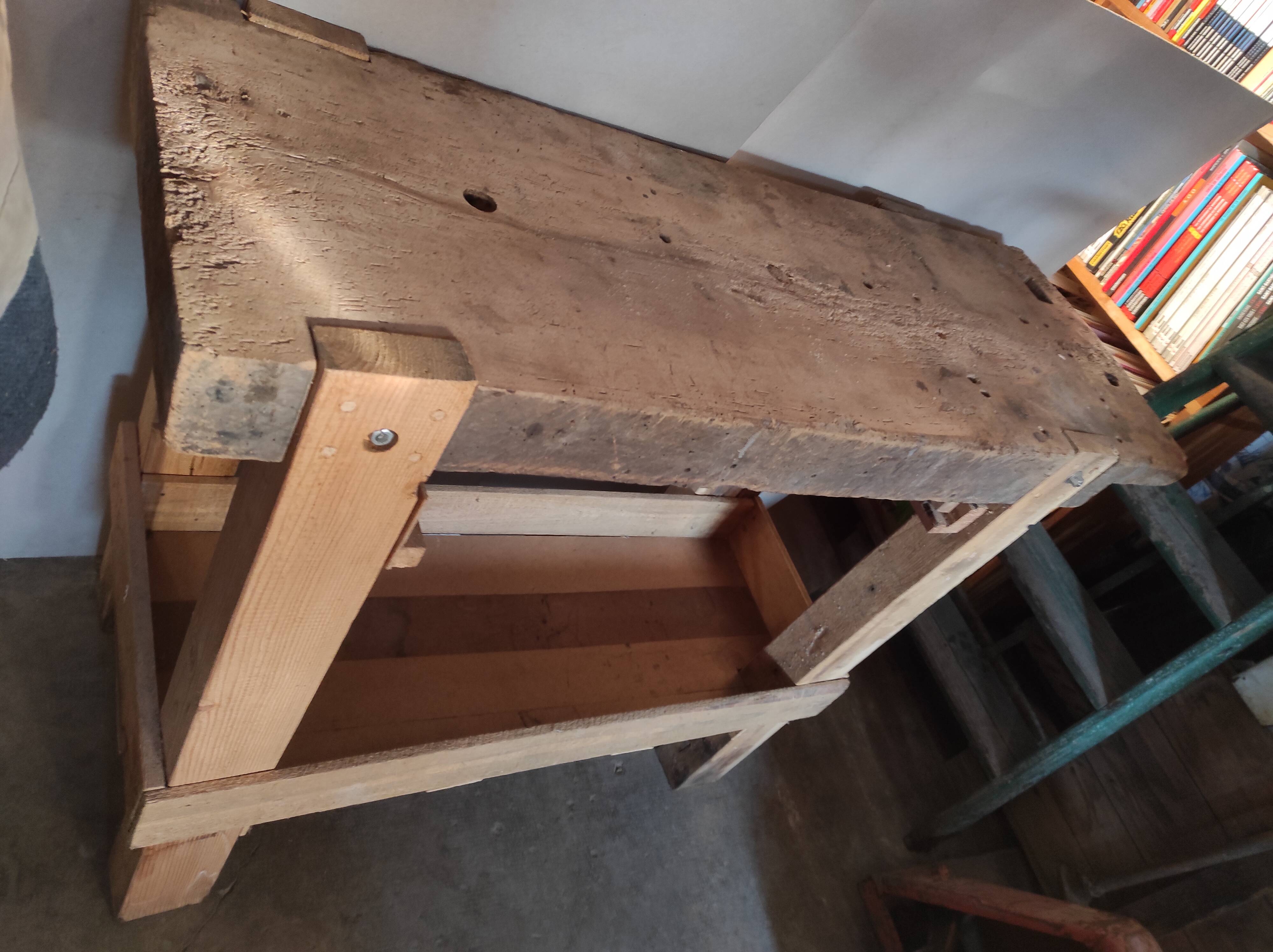 Old homemade vintage solid wood workbench with press and drawer