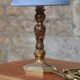 Vintage bedside lamp in gold metal – sculpted base and blue shade