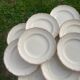 12 white old flat plates with brown fillet
