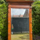Antique large trumeau mirror in solid wood and bevelled glass.