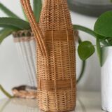 Grande bouteille en verre et osier