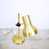 Articulated golden metal table lamp