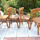 Suite of four foot bistro chairs with hoops / vintage 40s-50s