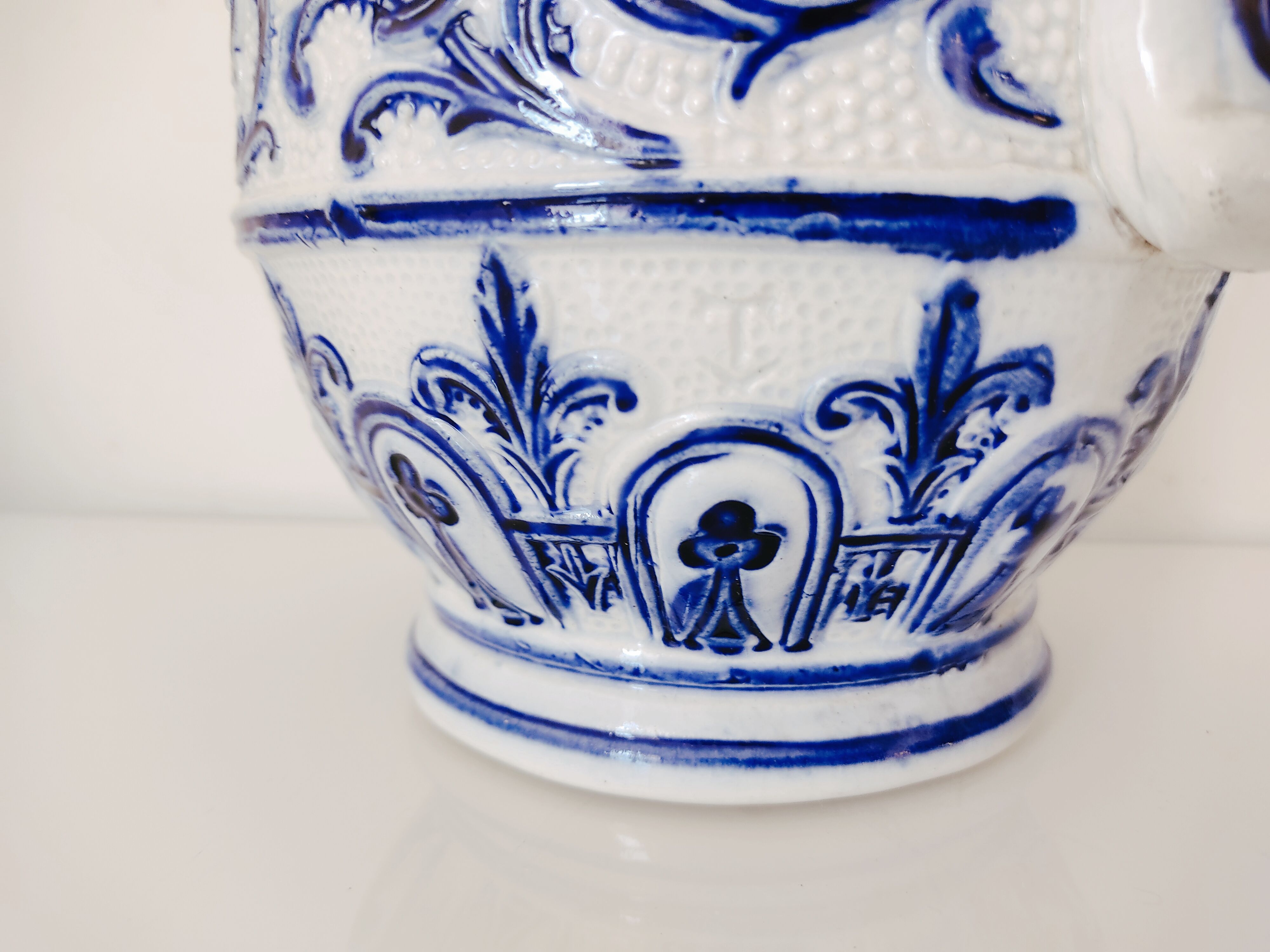 Blue and white pitcher