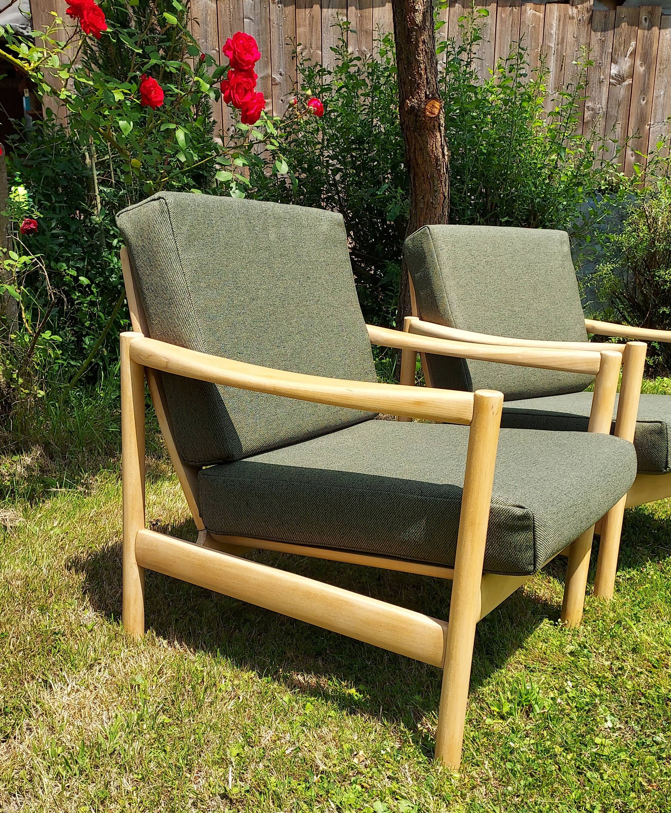 Pair of vintage 1970s armchairs in new fabric