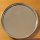 Round silver-plated metal tray and mirror