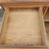 Vintage wooden buffet with a marble top.