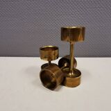 Three beautiful candle holders in solid brass, for block candles.