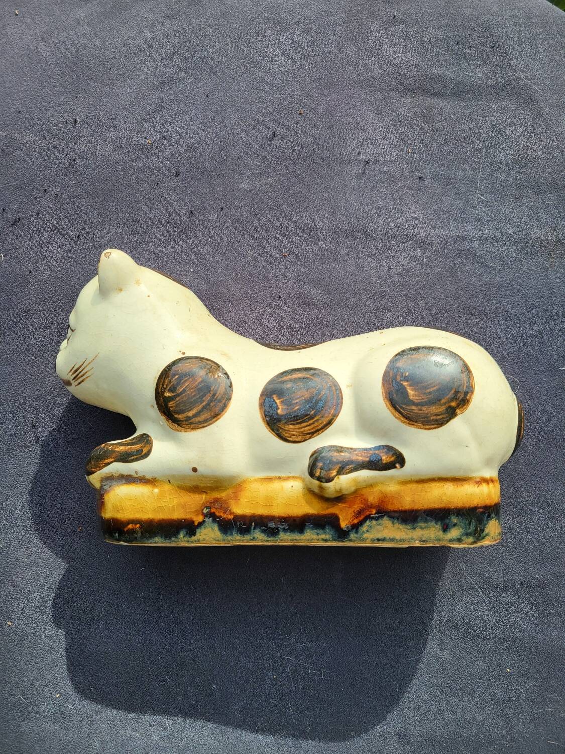 Cizhou style ceramic neck rest cat