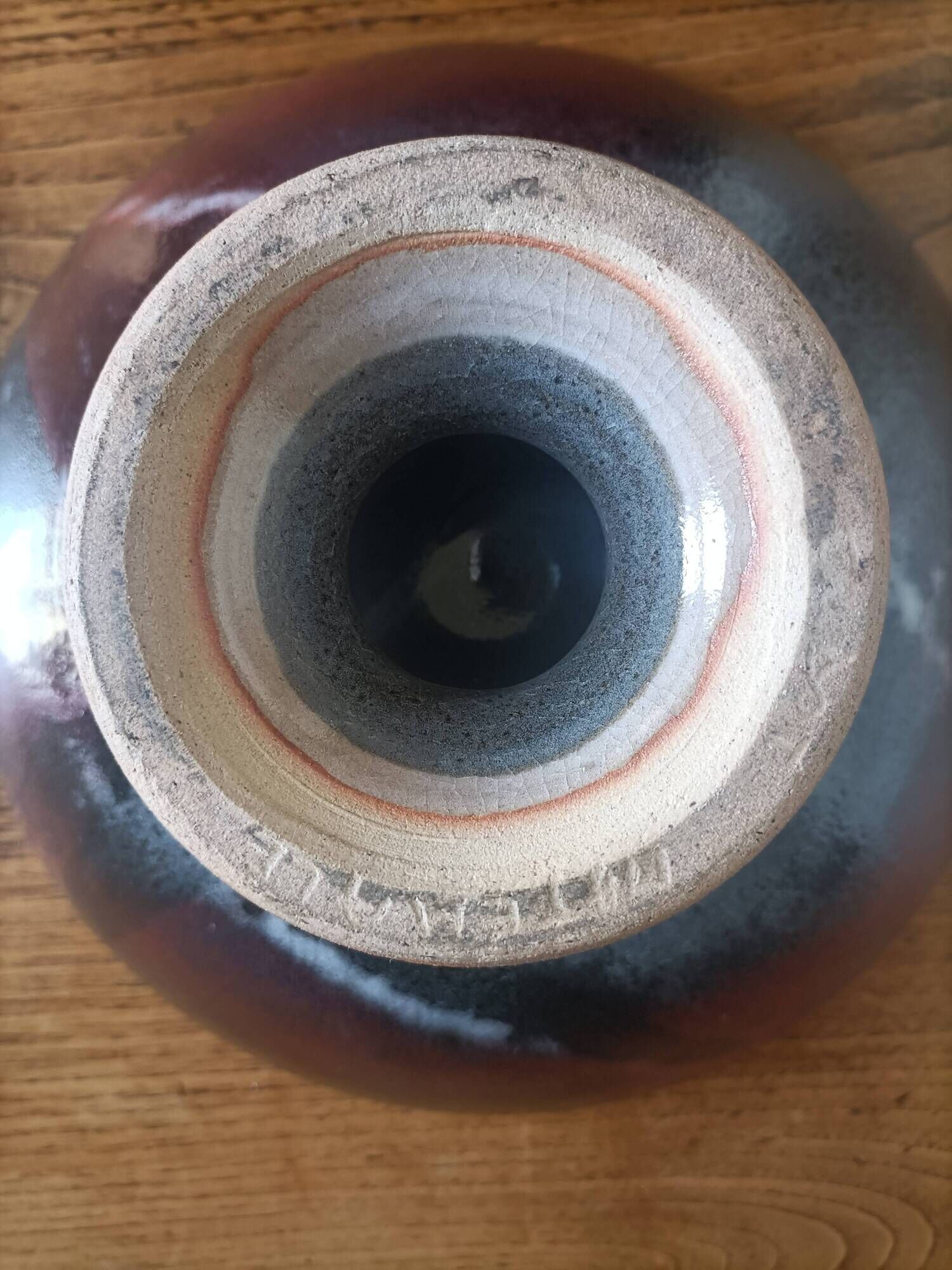 Signed ceramic fruit bowl on foot