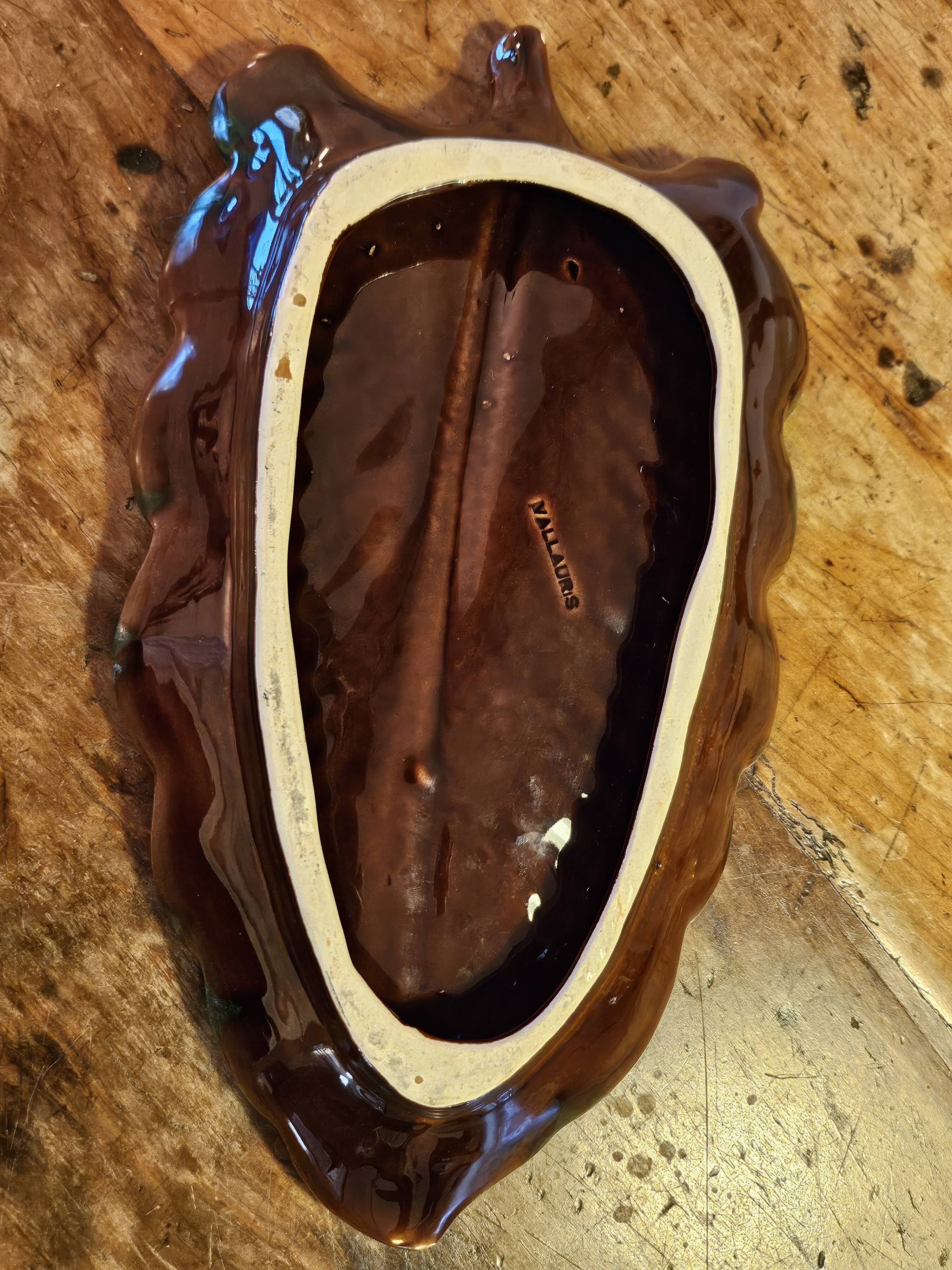Set of 2 leaf-shaped ceramic dishes from Vallauris.