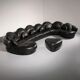 Organically shaped post-modern sectional sofa in black leather