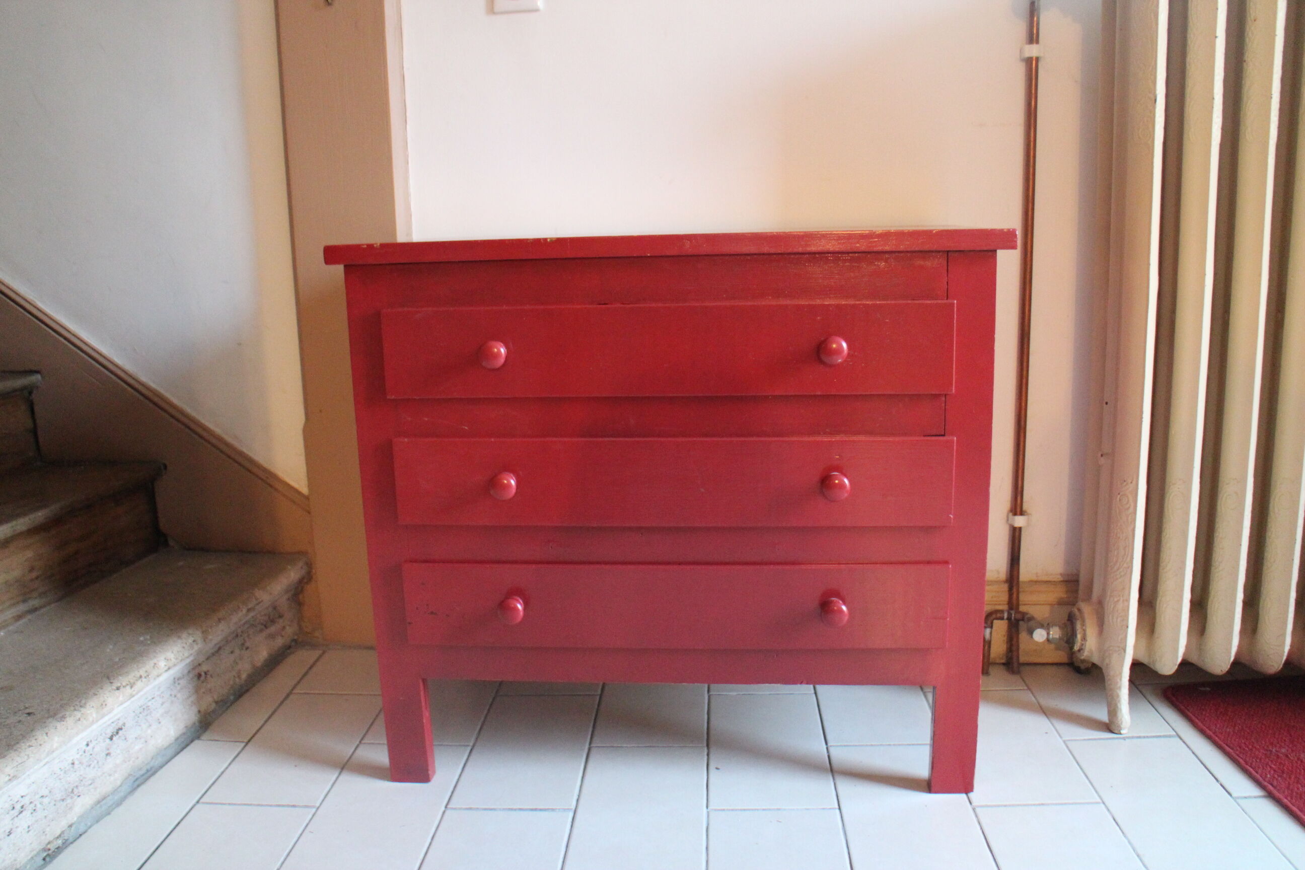 Red chest of drawers
