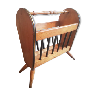 Scandinavian feet compass magazine rack.