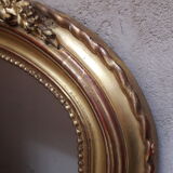 Golden mirror with pediment XIXth