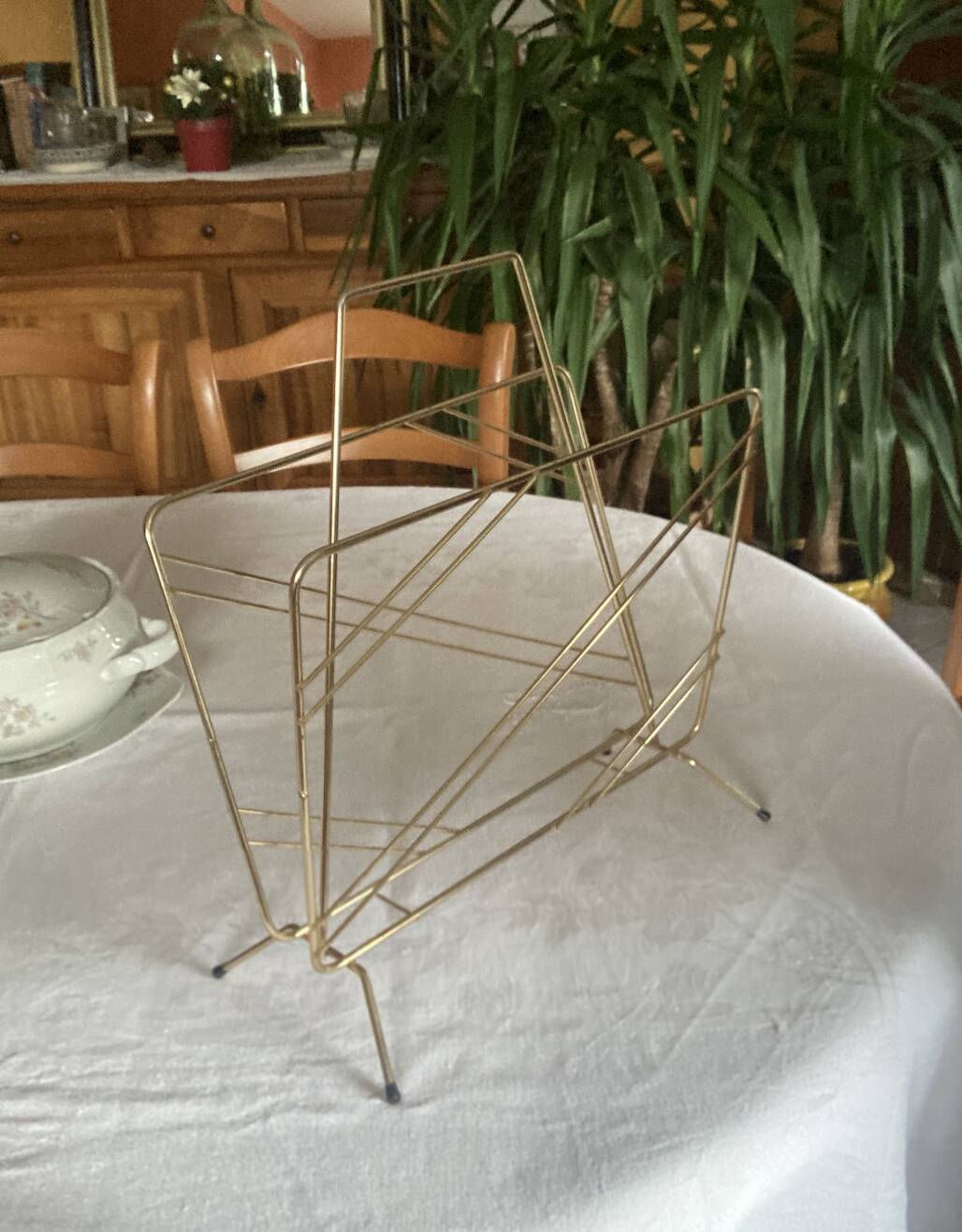 Vintage gold metal magazine rack