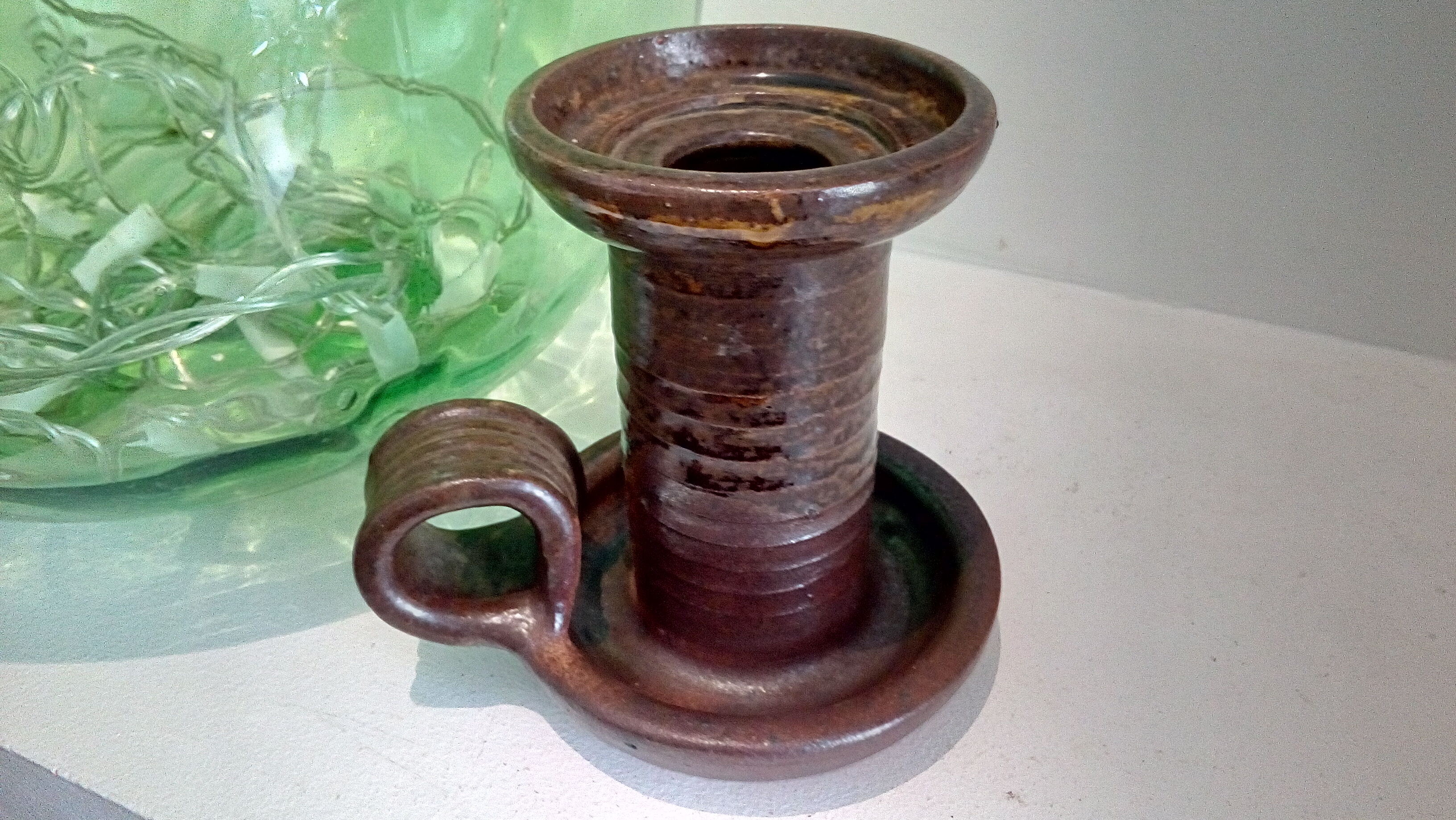 Signed sandstone candle holder