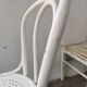 Set of 6 mismatched white chairs