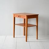 Scandinavian vintage teak nightstand with shelf and carved handle