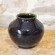Small glazed stoneware vase signed